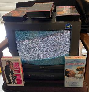 lot 79 image: Sharp TVVCR Combo VHS HQ w6 VHS Movies
