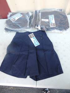 lot 104 image: NEW CFj lot of 9 girls navy wrap skirt size 10