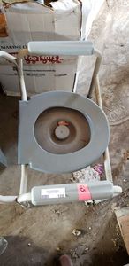 lot 106 image: Drive Portable Potty Chair, Bed Rail and Adult Diapers XXL