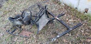 lot 108 image: Metal Go Kart Frame, fiberglass seat, tires and Misc framing