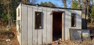 lot 150 image: Shed with electrical Hook ups and lights 16X8 with wood interior.
