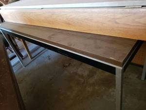 lot 62 image: Laminate Top Table 60x24x27 and Wooden Cabinet Ironing board