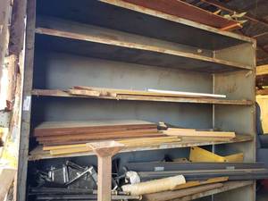 lot 77 image: Double Sided Metal Shelf, Contents included LARGE AND HEAVY