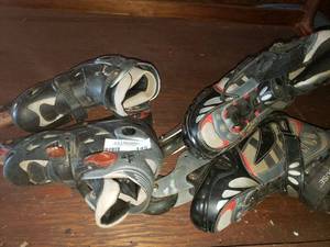lot 145 image: Two Pairs of Roller Blades One size 10 and One size 3