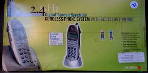 lot 72 image: VINTAGE OLYMPIA 2.4GHZ CORDLESS PHONE SYSTEM