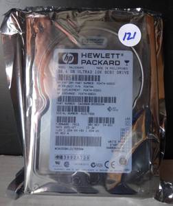 lot 121 image: UNUSED - HP P2474-69001 36.4GB 10K RPM Ultra3 SCSI 3.5 HDD P2474-63001