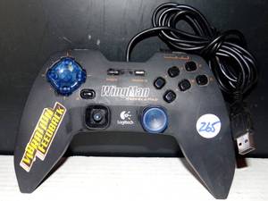 lot 265 image: Logitech WingMan Rumblepad (963233-0403) Gamepad - USED