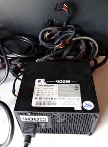 lot 290 image: CORSAIR POWER SUPPLY 400W CMPSU-400CX. New. No box.