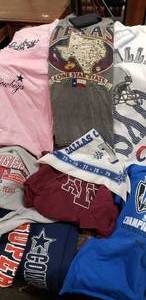 lot 72 image: Texas Sport Shirts and Sweatpants
