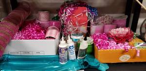 lot 24 image: Pink Mesh Ribbons, Curling Ribbon, Blue Iridescent Fabric, and Tacky Glue