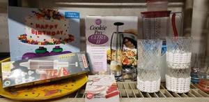 lot 16 image: Cookie Pro Ultra II, Cake Decorating Tools, Birthday Platter and Measuring Cups