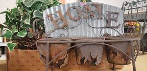 lot 84 image: Outdoor Metal Plant Holder, Artificial Plant in a Basket and Artificial Grapes