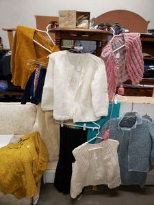 lot 228 image: Vintage Hand Made Clothes and Baby Shoes