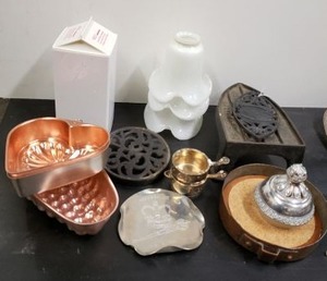 lot 187 image: Aluminum and Copper Dishes, Elizabeth II Crown Etching and Cast Iron Economical Stockwell & Co. Trivet