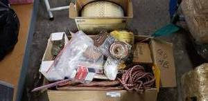 lot 195 image: Assorted Garage Lot as shown Includes Cordless Hex Screwdriver, A753C Air Filter, Aluminum Roll Flashing and Painters Trim Guard