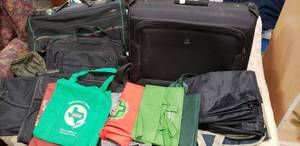 lot 183 image: Delsey Suitcase and Garment Bag, Samsonite Laptop Bag and Reusable Grocery Bags