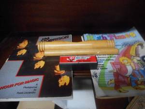 lot 149 image: Latin Percussion Claves, Hohner Old Standby Harmonica, Book on Jim Morrison and 1977 High Times Magazine