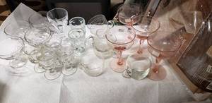 lot 107 image: Small Sets of Glasses, Peach Colored Glass Set, Tablecloth(Package says 60x102) and Table Cover