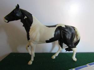 lot 20 image: Breyer Reeves 2006 Joker black pinto celebration model signed 12x9