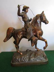 lot 56 image: Horse with roping cowboy 10x9  cast metal unmarked