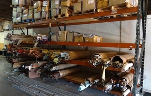 lot 11 image: 2 Industrial shelving racks.  Contents not included. Each section measures 12 x 12 x 44.