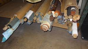 lot 13 image: Large selection of fabric rolls.  Generous quantity.  Patterns vary.
