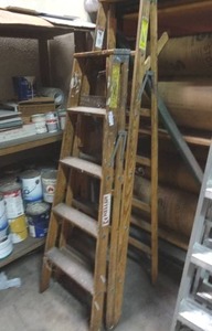 lot 24 image: 2 wooden step ladders.  6ft and 5 ft.