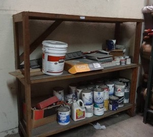 lot 25 image: Wooden shelf & contents including flooring & painting supplies.  Shelf measures 75 x 66