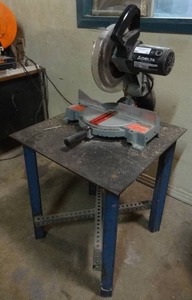 lot 26 image: Delta 10 compound miter saw w heavy duty metal stand.  Model 36-220
