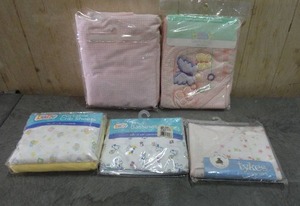lot 56 image: Baby bedding and bath accessories.  Includes crib sheets and hooded bath towels.  Never opened.