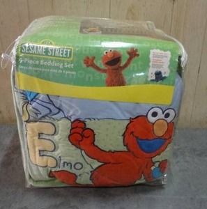 lot 59 image: Sesame Street 4-piece bedding set.  Never opened.