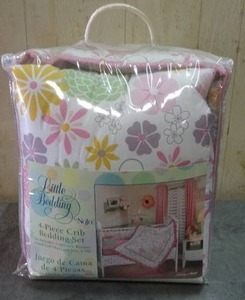 lot 61 image: Little Bedding by Nojo 4-piece crib bedding set.  Never opened.