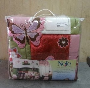 lot 67 image: Nojo 6-piece crib bedding set.  Never opened.