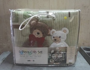 lot 74 image: Lambs & Ivy 6-piece crib bedding set.  Never opened.