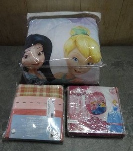lot 77 image: Disney Princess crib bedding & nursery accessories.  Includes bedding, hamper and valance.  Never opened.