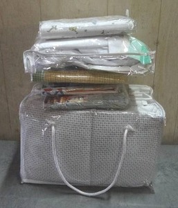 lot 84 image: Baby bedding and nursery accessories.  Includes 4-piece bumper, crib pads, ruffles & valances.  Never opened.