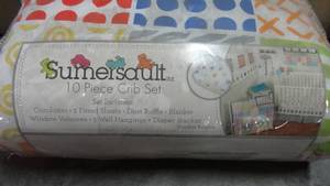 lot 87 image: Sumersault 10-piece crib bedding set.  Never opened.