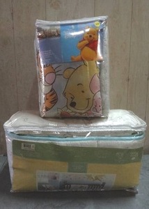 lot 89 image: Disney Winnie the Pooh 4-piece and 3-piece bedding sets.  Never opened.