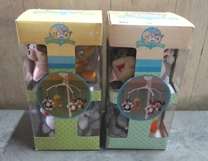 lot 92 image: Baby Looney Tunes musical mobiles.  Quantity of 2.  Never opened.