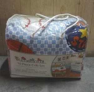 lot 96 image: Sumersault All Star 10-piece crib bedding set.  Never opened.