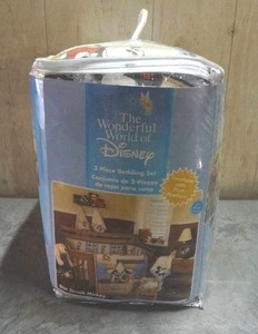 lot 98 image: Disney Mickey & Minnie 3-piece crib bedding set.  Never opened.