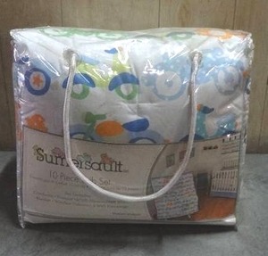 lot 100 image: Sumersalut Vroom Vroom 10-piece crib bedding set.  Never opened.