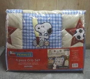lot 105 image: Peanuts Champ Snoopy 4-piece crib bedding set.  Never opened.