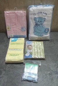 lot 111 image: Disney, Gund & other brands baby bedding and accessories. Includes blankets, ruffles, valance & more. Never opened