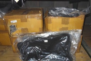lot 124 image: Solid black 100% cotton t-shirts.  4 boxes.  Size large.
