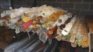 lot 126 image: Large selection of fabric rolls.  Generous quantity.  Patterns vary.