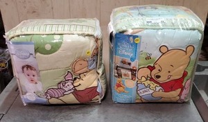 lot 44 image: 2 Disney Winnie the Pooh Crib Bedding Sets.  Never opened.