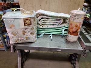 lot 47 image: Precious Moments baby bedding and accessories. Includes 3-pc crib set (new), 4-pc toddler bed set (new) and 2 crib bumpers