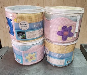 lot 48 image: Baby by Carters Bumpers Guards, quantity of 4.  Never opened.
