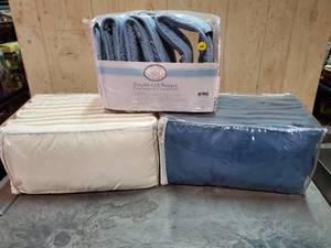 lot 50 image: Koala Baby portable crib bumpers.  Quantity of 4.  Never opened.